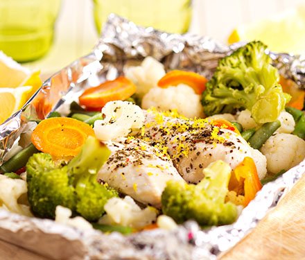 Chicken and veggies wrapped in foil